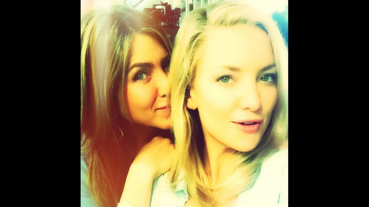 Kate Hudson, right, takes a selfie with fellow actress Jennifer Aniston on Wednesday, September 2. "Who's that gorgeous lady peekin over my shoulder?" <a href="https://instagram.com/p/7JnSEPpcrP/?taken-by=katehudson" target="_blank" target="_blank">Hudson said on Instagram.</a> The two are filming a movie together called "Mother's Day."