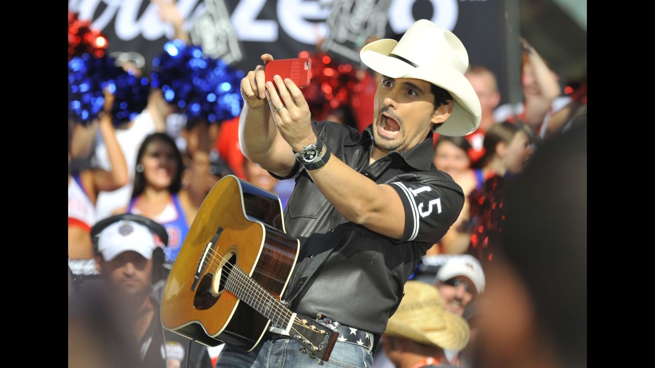 Country singer Brad Paisley makes a funny face while performing live on the set of ESPN's "College GameDay" on Saturday, September 5.