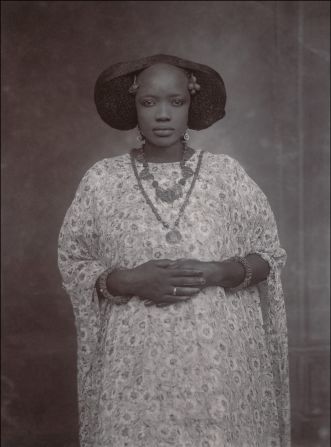 Over a century's worth of portraits detailing the intimate lives of West Africans have gone on show for the first time in New York. The exhibition at The Metropolitan Museum of Art, titled "<a href="index.php?page=&url=http%3A%2F%2Fwww.metmuseum.org%2Fabout-the-museum%2Fpress-room%2Fexhibitions%2F2015%2Fin-and-out-of-the-studio" target="_blank" target="_blank">In and Out of the Studio: Photographic Portraits from West Africa</a>,"  looks at the earliest pioneers of African photography.<br /><br />Renowned artists such as Samuel Fosso and Seydou Keita take their place alongside many lesser known photographers in a captivating journey capturing snapshots from the lives of everyone from the metropolitan upper classes through to the very poorest rural communities in countries including Senegal, Cameroon, Mali and Gabon. Drawn deep from the museum's vaults, the exhibition features photos, cartes de visites, postcards, real photo postcards and original negatives taken between the 1870s and the 1970s.<br /><br />"The earliest images in the exhibition, taken by professional and amateur photographers in the urban centers of Ghana, Togo, and Senegal, are the most moving and should not be missed as they convey an entirely different narrative than the one disseminated through the colonial channels at the time," says curator Yaelle Biro.<br /><br />"'In and Out of the Studio' is a rare opportunity to see how photographers and sitters collaborated to fashion their sense of self and define their own modernity," she continues.<br /><br /><strong>The exhibition runs until January 3, 2016 -- Gallery 916, The Metropolitan Museum of Art, New York. Go through the gallery above to see some of the powerful images and read descriptions by the curator. </strong><br /> <br />Portrait of a Woman, ca. 1910<br />Unknown Artist (Senegal)<br />Glass negative