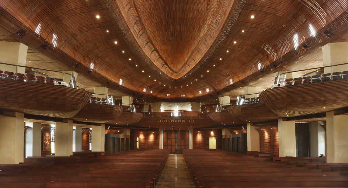This catholic church was designed to seat up to 500 people in its canoe-like balconies. Natural materials such as stone and timber are used throughout the design.