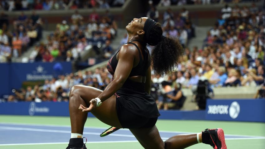 Serena Williams of the US reacts as she plays against her sister Venus Williams during their 2015 US Open Women's singles quarterfinals match at the USTA Billie Jean King National Tennis Center in New York on September 8, 2015. AFP PHOTO/JEWEL SAMAD        (Photo credit should read JEWEL SAMAD/AFP/Getty Images)