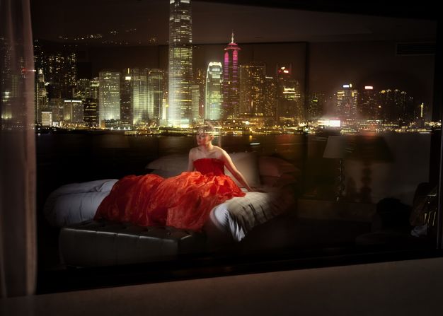 American photographer David Drebin often stages mysterious femme fatales against cinematic backdrops.<br />
