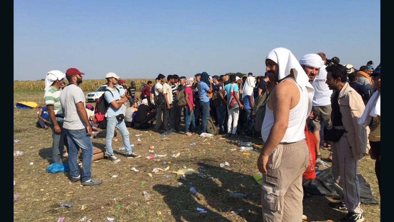 Refugees were told to wait in a field, with no shelter from the elements.