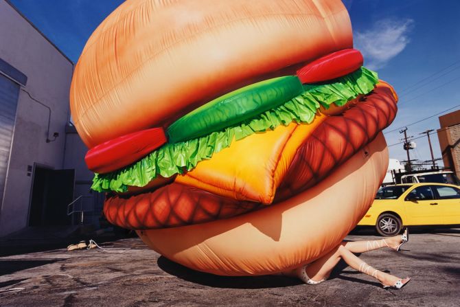 Andy Warhol offered David LaChappelle his first job as a photographer at Interview Magazine. Death by a Hamburger (2001) shown above, is an example of LaChappelle's surreal and often humorous aesthetic.