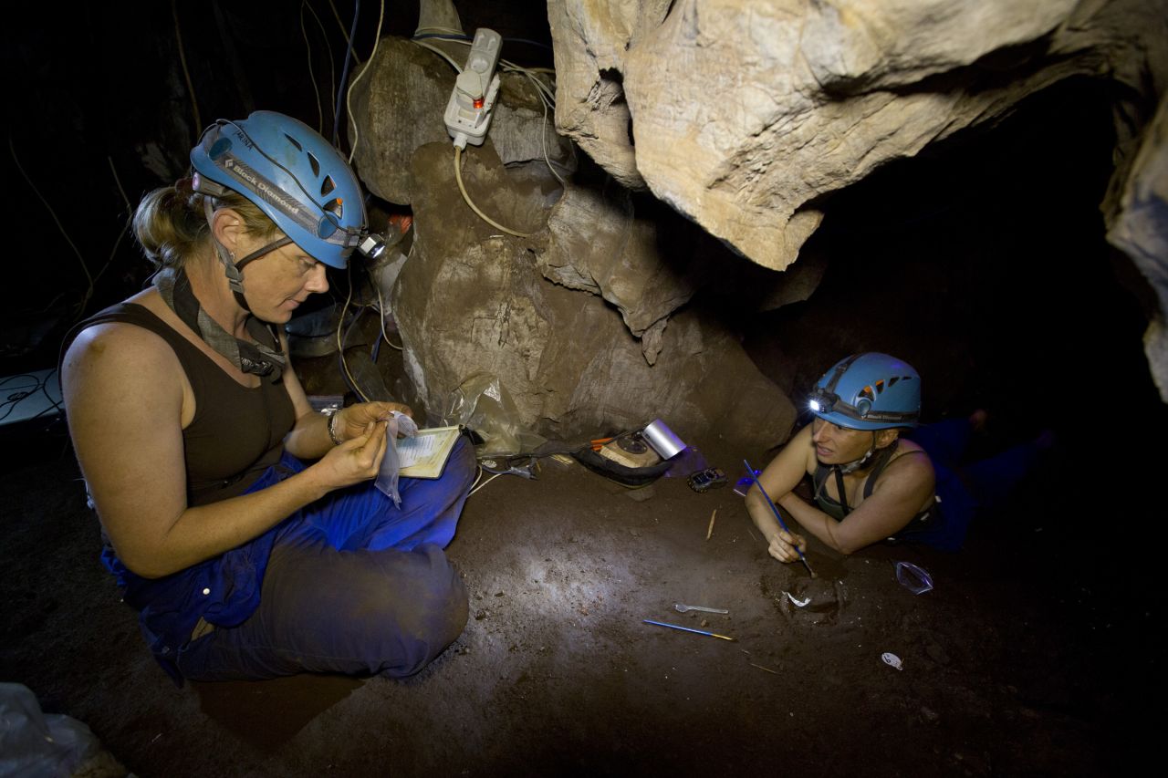 "Underground astronauts" Marina Elliott and Becca Peixotto work inside the cave where fossils of Homo naledi were discovered.