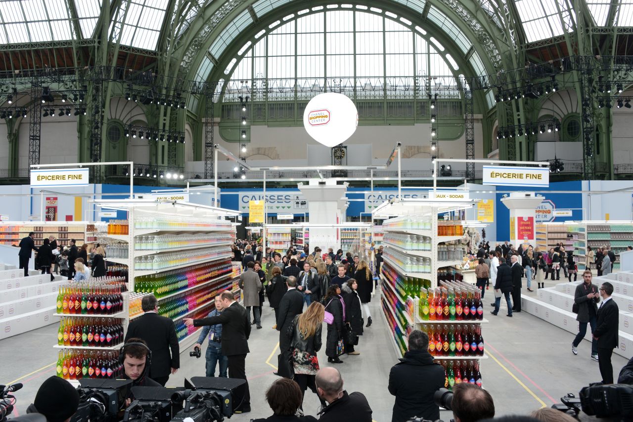 Chanel's fall/winter 2014/2015 show in Paris playfully turned the Grand Palais in Paris into a high fashion grocery store. 