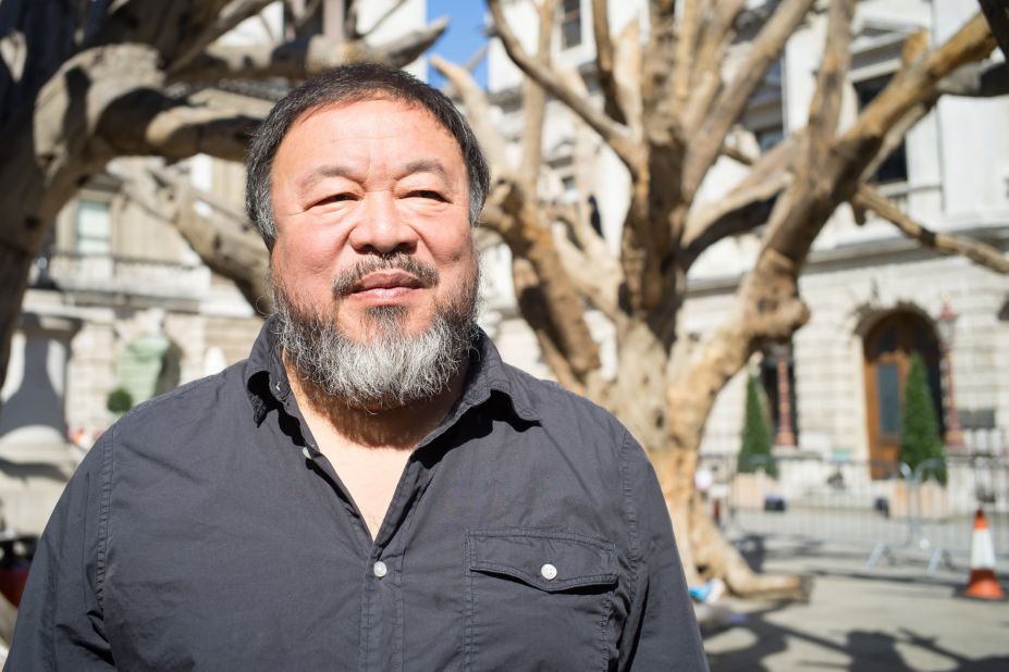 The Chinese artist Ai Weiwei is attending an exhibition of his work outside China for the first time in five years. He was granted a passport this July by the Chinese authorities, four years after it was confiscated.<br /><br />Here, he stands among his trees at the Royal Academy of Arts in London.