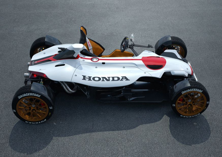 Positioning the wheels at the corner of Honda's Project 2&4 concept should give the car kart-like handling. The 999cc V4 engine is lifted from the firm's RC213V MotoGP bike, as ridden by MotoGP riders Marc Marquez and Dani Pedrosa.