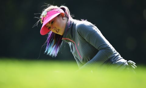 American Michelle Wie plays a shot during a disappointing opening round of 75. 