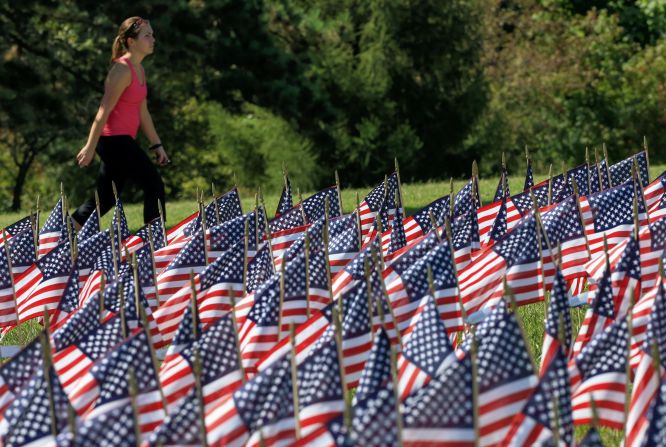 Flags carry the names of the 9/11 victims at Memorial Park in Omaha, Nebraska, on September 10.