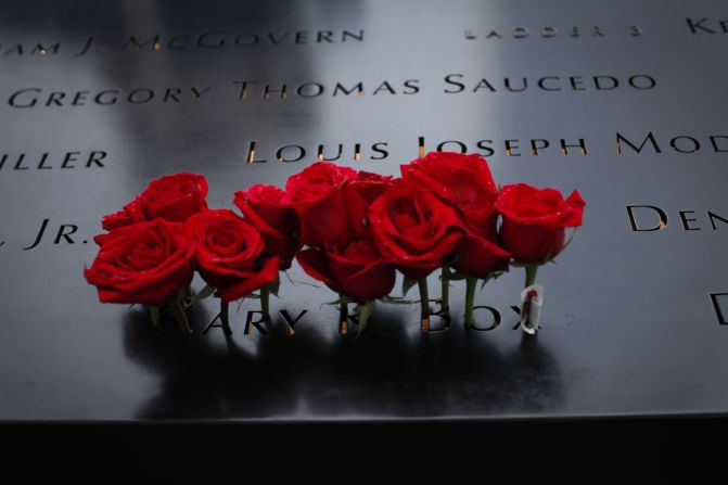 Roses are placed Friday at the National September 11 Memorial in New York before a ceremony commemorating the 14th anniversary of the attacks.