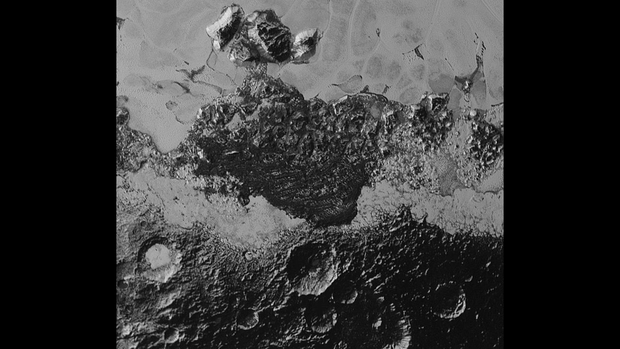 Pluto's landscape has lots of variety: plains, mountains, craters and what looks like they might be dunes. The smallest details on the photos are about half a mile wide. The area with the craters is ancient, scientist say. The smooth frozen planes are relatively young.