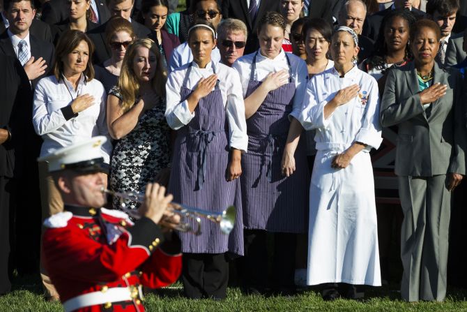 A bugler plays taps during Friday's ceremony on the South Lawn of the White House.