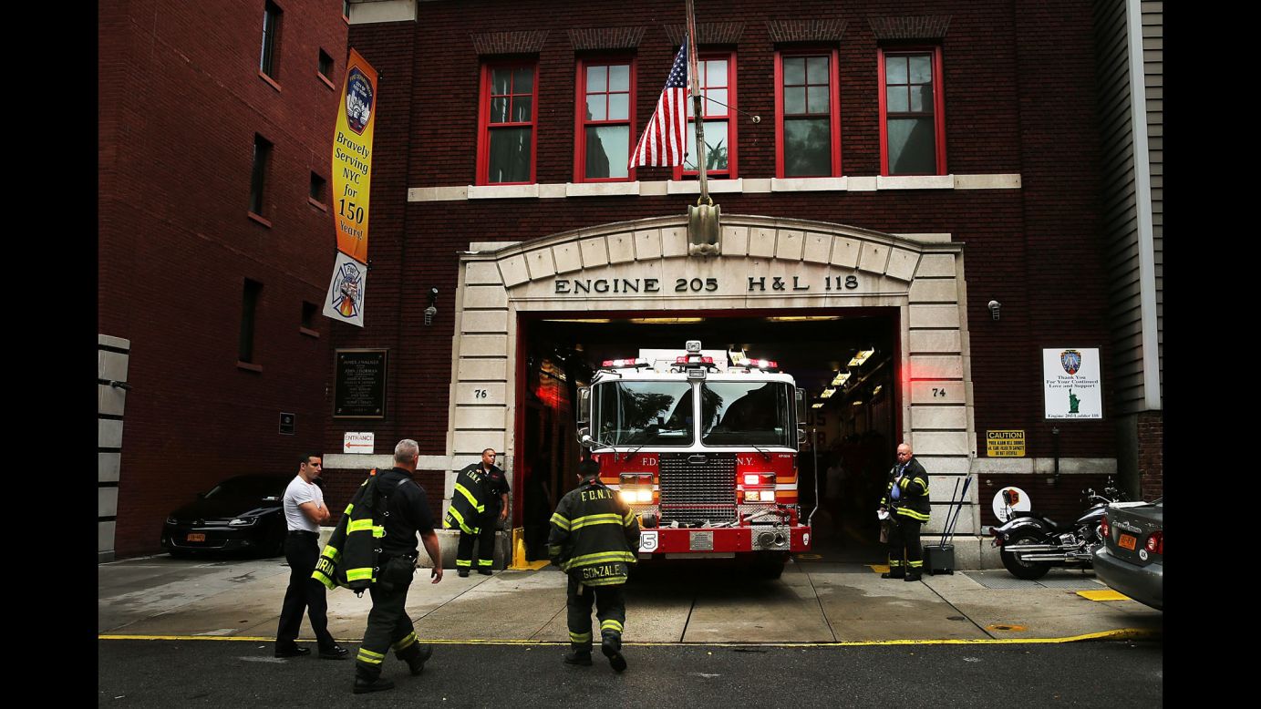 Engine Company 205/Ladder Company 118 in New York's Brooklyn Heights remember the eight firefighters it lost on 9/11, including six who died in their firetruck under the rubble. 