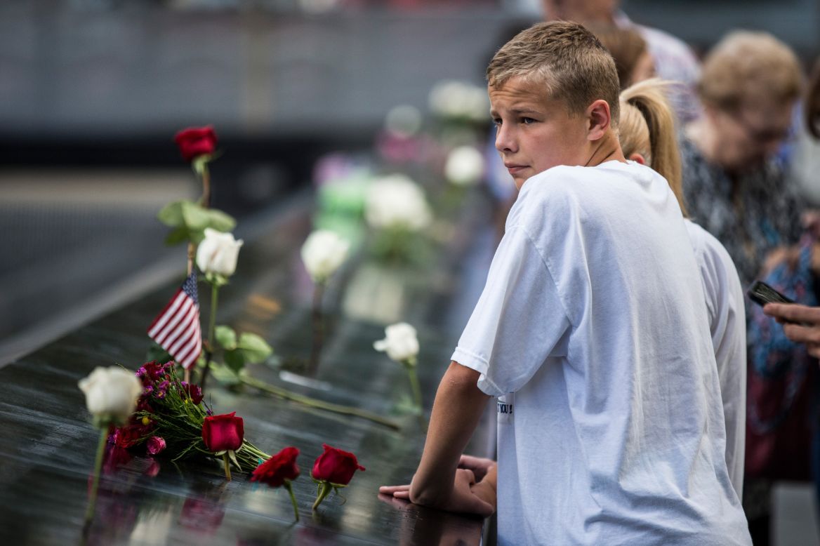 Gary Mascitis, 14, pays tribute to his uncle during an anniversary ceremony for the attacks in New York. Two hijacked planes hit the World Trade Center on 9/11. A third plane crashed into the Pentagon outside Washington and a fourth into a Pennsylvania field.