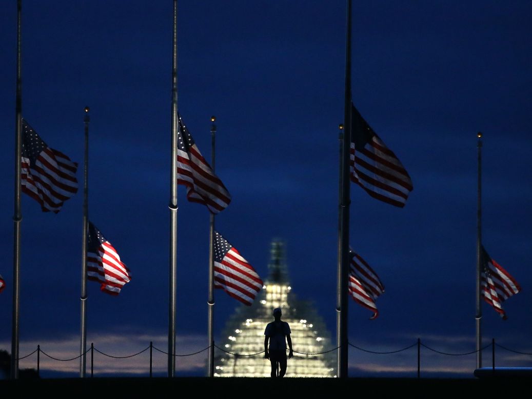 American flags are lowered to half-staff at the Washington Monument on September 11. 