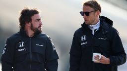 SHANGHAI, CHINA - APRIL 10:  Fernando Alonso of Spain and McLaren Honda and Jenson Button of Great Britain and McLaren Honda walk through the paddock during practice for the Formula One Grand Prix of China at Shanghai International Circuit on April 10, 2015 in Shanghai, China.  (Photo by Mark Thompson/Getty Images)