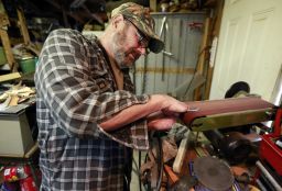 ORIG  Rob Kerr / The Bulletin  Prineville, Ore. Mon. Nov. 18, 2013 
Seventeen months after a stray cat bit him and gave him the plague, Paul Gaylord is back to the craft of making knives at his home workshop. 