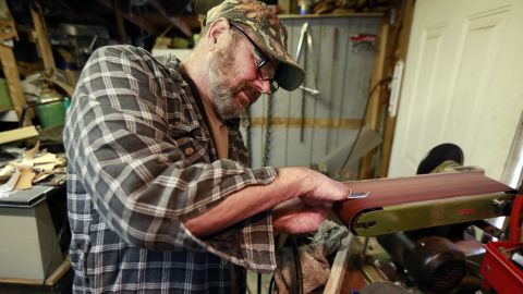 ORIG Rob Kerr / The Bulletin Prineville, Ore. Mon. Nov. 18, 2013
Seventeen months after a stray cat bit him and gave him the plague, Paul Gaylord is back to the craft of making knives at his home workshop.