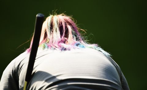 Michelle Wie, who is sporting rainbow-colored hair this week, was off-color in round one, but returned to form on Friday, shooting a 66 to lift the American to a tie for 20th alongside world No. 1 Inbee Park.