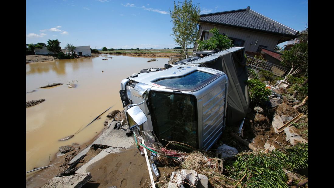 A truck and a house are damaged in Joso on September 11.