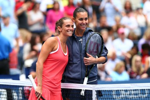 Vinci and  Pennetta pose for a photo prior to all-Italian final at Flushing Meadows in New York.