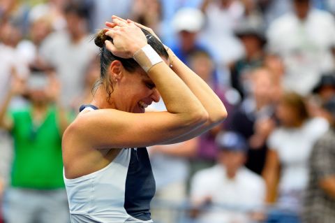 Pennetta savors the moment of victory after clinching her first grand slam title with victory in the U.S. Open.  