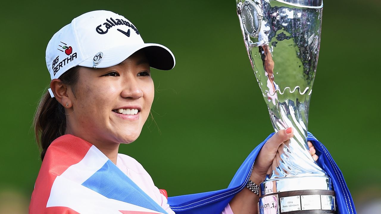 Lydia Ko of New Zealand holds the trophy aloft after winning the Evian Championship in France. 