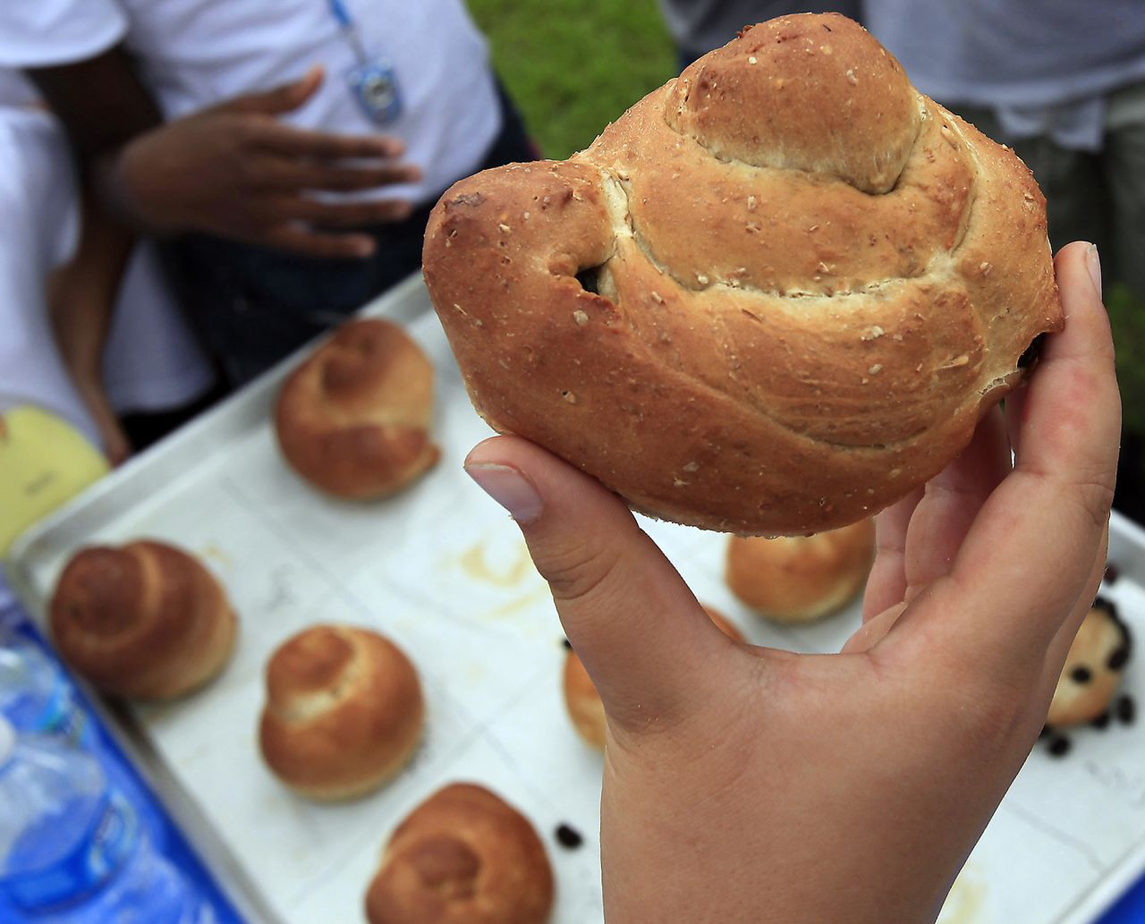 Round loaves of challah bread are also often dipped in honey during the celebrations. 