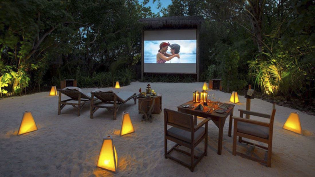 Guests can watch the "stars" under the stars at <a href="http://www.venuereport.com/roundups/22-incredible-outdoor-cinemas-worldwide/entry/8/" target="_blank" target="_blank">Gili Lankanfushi's</a> "jungle" cinema in the sand. For a little more privacy, staff will move the cinema to guests' overwater bungalows for a private viewing.  