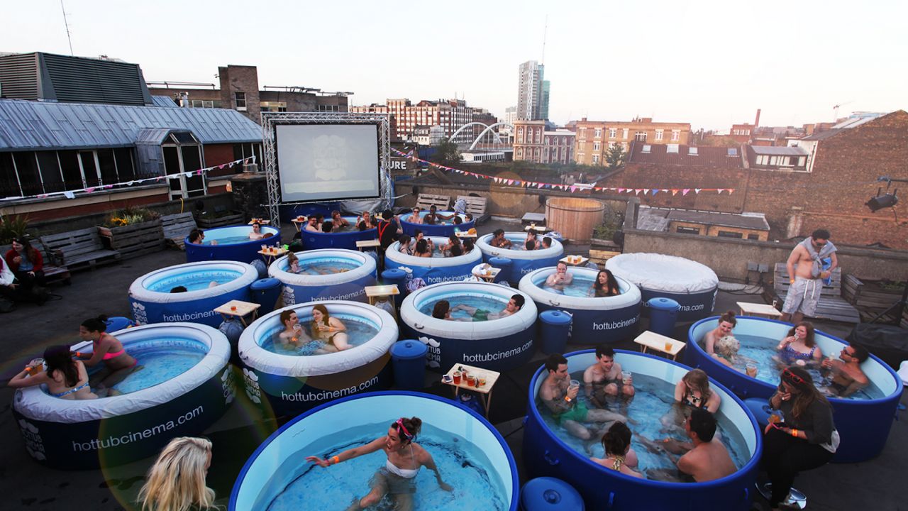 Watching a movie from a hot tub on a rooftop -- the perfect way to spend your summer evening.