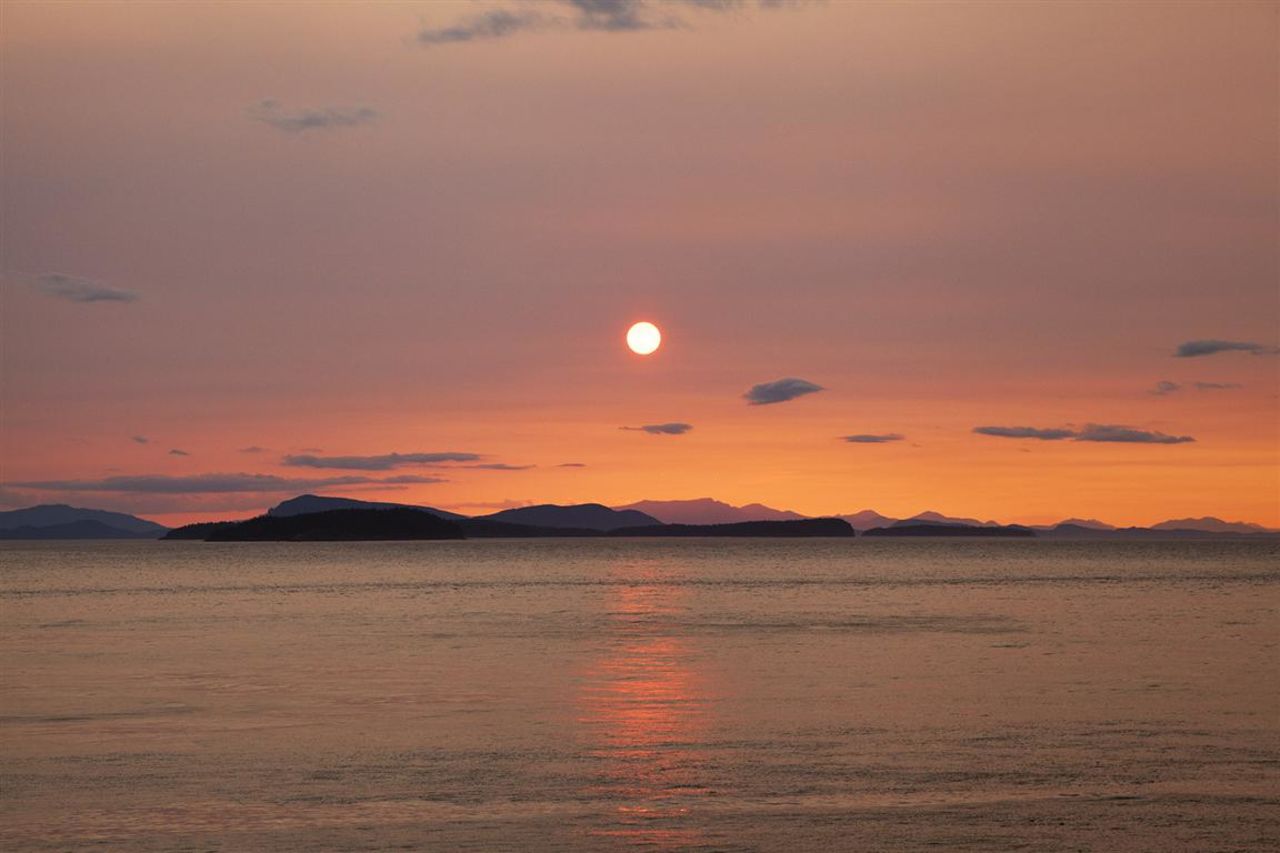 Who needs palm trees when you've got sunsets like this? Lummi is a quiet, evergreen-covered island off the coast of Washington State. 