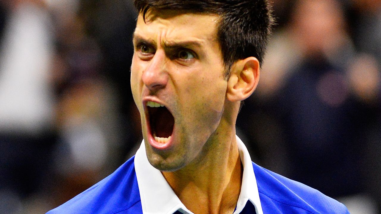 NEW YORK, NY - SEPTEMBER 13:  Novak Djokovic of Serbia celebrates a point late in the fourth set against Roger Federer of Switzerland during their Men's Singles Final match on Day Fourteen of the 2015 US Open at the USTA Billie Jean King National Tennis Center on September 13, 2015 in the Flushing neighborhood of the Queens borough of New York City.  (Photo by Alex Goodlett/Getty Images)