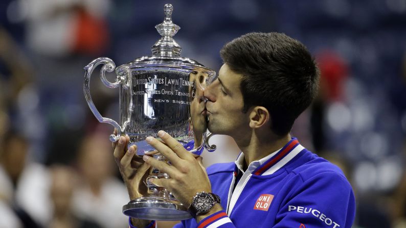 Novak Djokovic kisses his trophy <a href="index.php?page=&url=http%3A%2F%2Fwww.cnn.com%2F2015%2F09%2F13%2Ftennis%2Fu-s-open-djokovic-federer-tennis%2F" target="_blank">after winning the U.S. Open</a> on Sunday, September 13. Djokovic defeated Roger Federer in four sets to claim the 10th major title of his career.