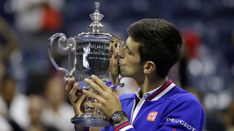 Novak Djokovic kisses his trophy <a href="index.php?page=&url=http%3A%2F%2Fwww.cnn.com%2F2015%2F09%2F13%2Ftennis%2Fu-s-open-djokovic-federer-tennis%2F" target="_blank">after winning the U.S. Open</a> on Sunday, September 13. Djokovic defeated Roger Federer in four sets to claim the 10th major title of his career.