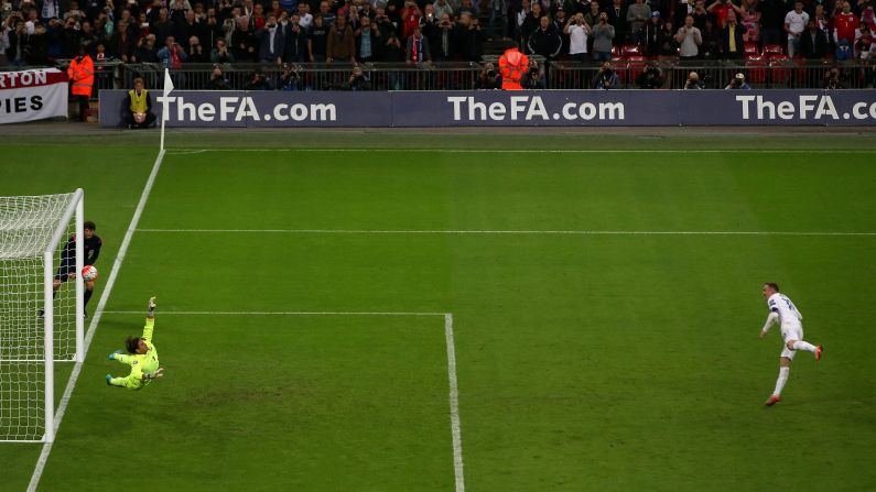Wayne Rooney scores against Switzerland on Tuesday, September 8, breaking Bobby Charlton's career record for most England goals. Rooney's 50th international goal capped a 2-0 victory in London and clinched England's spot in Euro 2016.