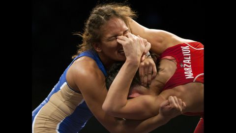 Brazilian freestyle wrestler Aline Ferreira is poked in the eyes by Belarus' Vasilisa Marzaliuk during the World Wrestling Championships in Las Vegas on Thursday, September 10.