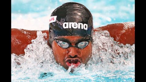 Nishwan Ibrahim, a swimmer from the Maldives, competes in the 100-meter butterfly at the Commonwealth Youth Games on Wednesday, September 9.