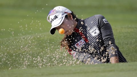 Mi Hyang Lee plays a shot out of the bunker Sunday, September 13, during the final round of the Evian Championship in Evian, France. She finished the tournament tied for fourth.