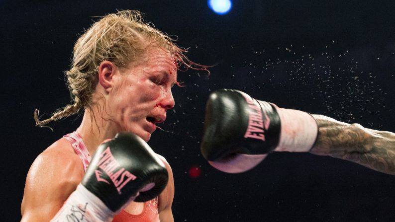 Sandy Tsagouris punches Shannon O'Connell during their featherweight bout in Toronto on Friday, September 11. Tsagouris won by unanimous decision.