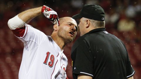 Cincinnati's Joey Votto gets in the face of umpire Bill Welke after he was ejected for arguing balls and strikes on Wednesday, September 9.
