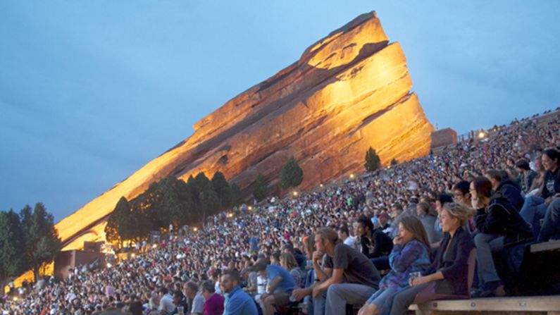 Ever thought you'd sit with 16,000 of your closest friends to watch a movie in an "acoustically perfect" amphitheater described by some as "carved by Mother Nature herself?" Every summer, the<a href="http://www.venuereport.com/roundups/22-incredible-outdoor-cinemas-worldwide/entry/16/" target="_blank" target="_blank"> Red Rocks Amphitheater's</a> Film on the Rocks season hosts a series of move screenings, each of which is preceded by a comedian and a performance by a local band. 