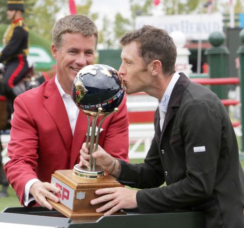 The world No.1 kisses the CP International Grand Prix trophy, and joins fellow Brit Pippa Funnel as the only other rider to win a grand slam in equestrian. 