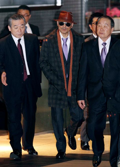 Kenichi Shinoda (center), head of Japan's largest organized crime syndicate, the Yamaguchi-gumi, after his release from prison in 2011.