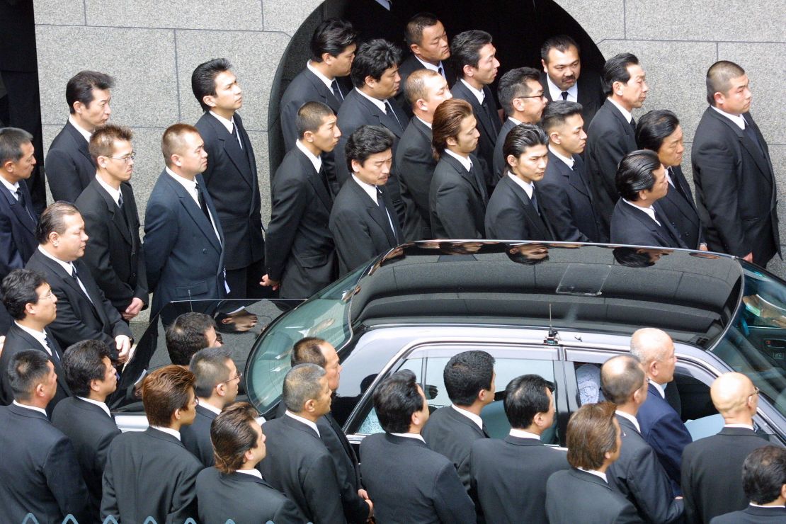 Yamaguchi-gumi members gather at their leader's funeral in Kobe, Japan.