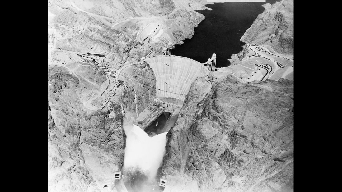 It was September 1935 when President Franklin D. Roosevelt dedicated the massive Hoover Dam, a marvel of modern engineering when it was completed in a remote, unforgiving desert during the Great Depression. By harnessing the mighty Colorado River, the concrete structure on the Arizona-Nevada border provided electricity to the Southwest, helped irrigate 2 million acres and fueled the development of Los Angeles, Las Vegas and Phoenix. Here's a look at the dam and its construction.