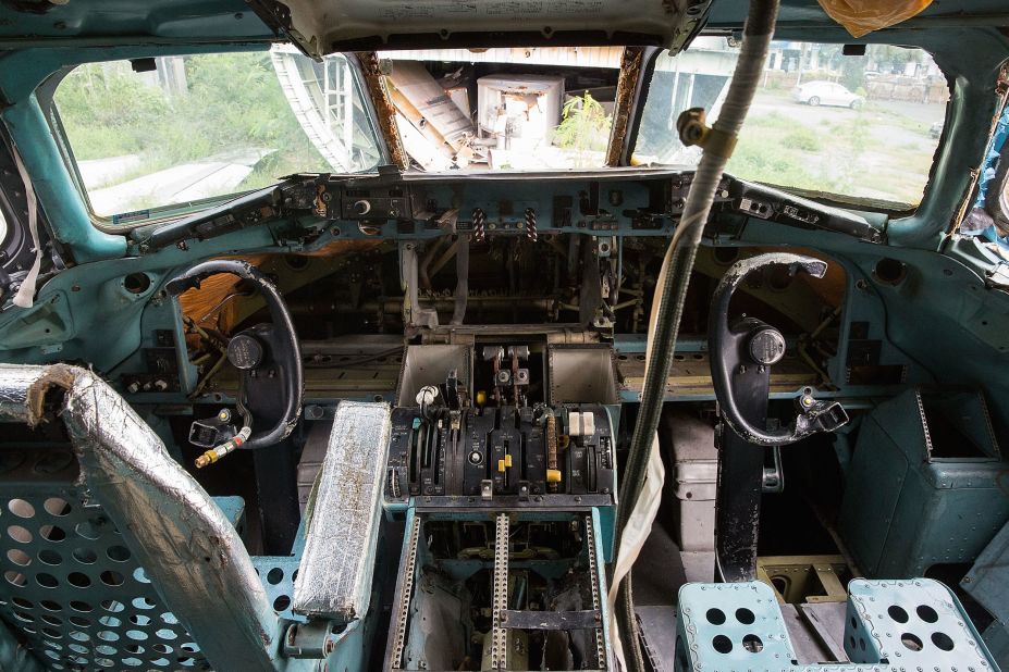 Inside the cockpit of the Bangkok plane graveyard's McDonnell Douglas MD-82, somewhat unsophisticated controls -- by modern standards at least -- give an indication as to the age of the plane.