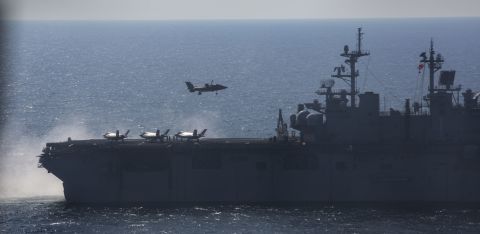 An F-35 B Lightning II fighter lands on the flight deck of the amphibious assault ship USS Wasp during short take-off, vertical landing operations in May. A new Pentagon report says the testing did not adequately reflect conditions the aircraft would face in real operations.