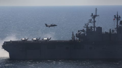 An F-35B Lightning II Joint Strike Fighter lands on the flight deck of the amphibious assault ship USS Wasp