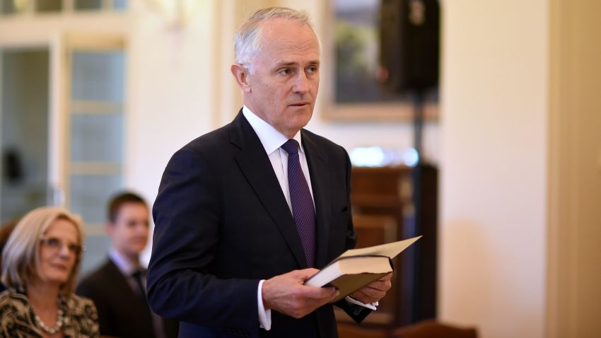 CANBERRA, AUSTRALIA - SEPTEMBER 15:  Malcolm Turnbull (L) is sworn in by Australia's Governor-General Sir Peter Cosgrove as Australia's 29th Prime Minister at Government House on September 15, 2015 in Canberra, Australia. Malcolm Turnbull won a Liberal Party leadership ballot 54-44 last night, and will be sworn in this morning as 29th Australian Prime Minister by Governor-General Sir Peter Cosgrove. Julie Bishop remains deputy leader, after defeating Kevin Andrews 70-30 in the party ballot. (Photo by Lukas Coch - Pool/Getty Images)